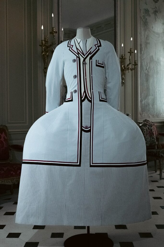 An unusual white dress suit on display.